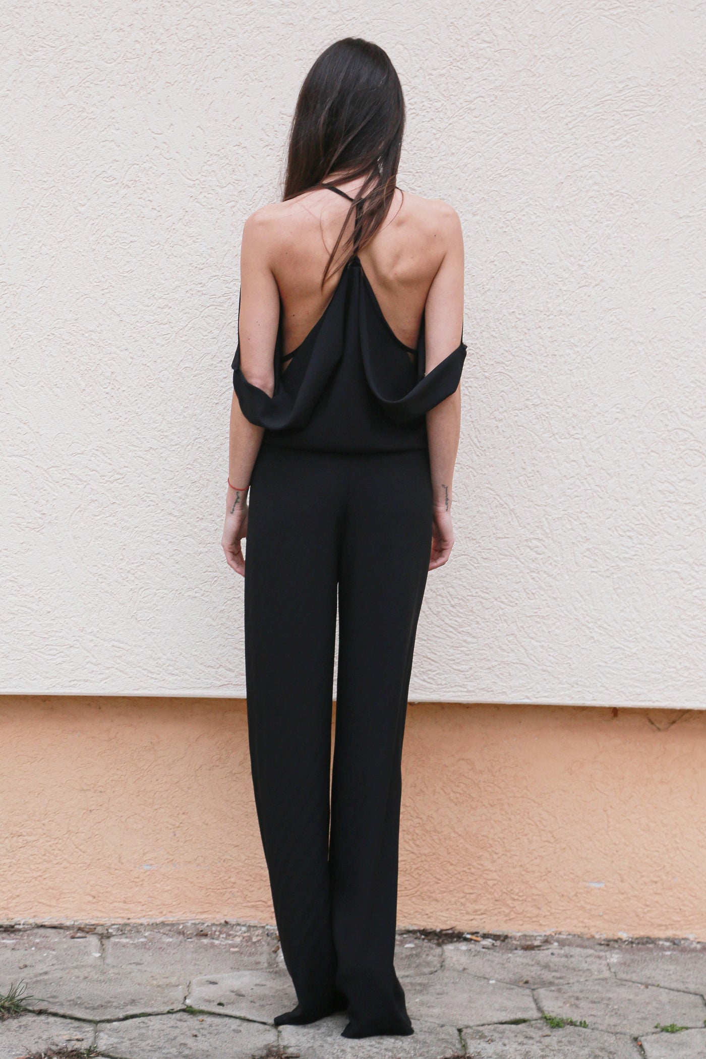 Black jumpsuit with open back F1558
